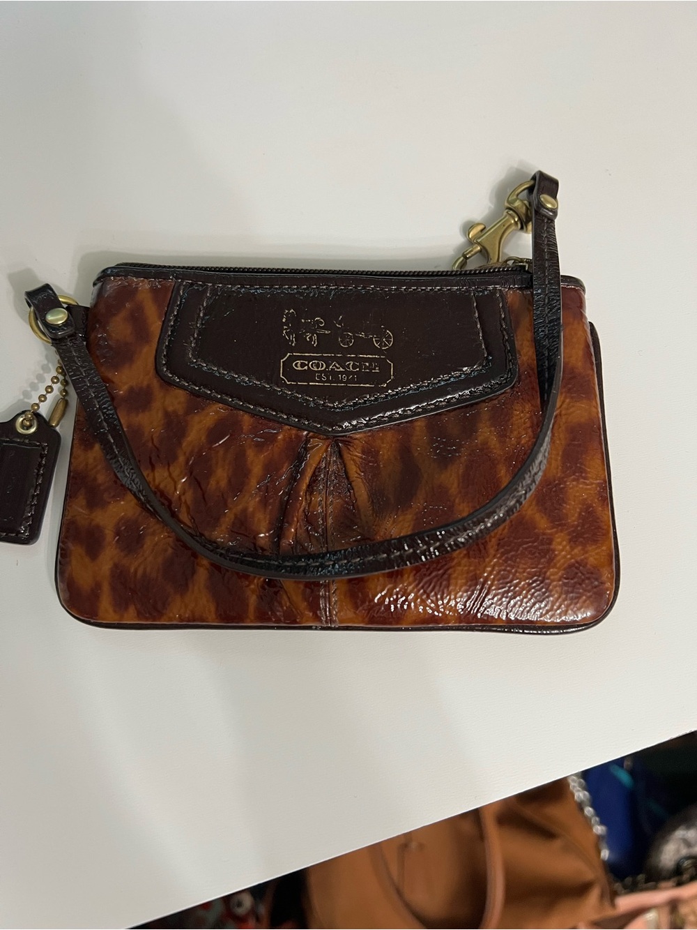 Coach Tortoiseshell Patent Leather Wristlet in Brown and Dark Brown